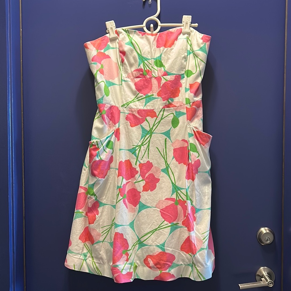 Lilly Pulitzer strapless dress with pockets. White, pink, and green.